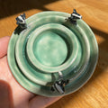 Dancing badgers tea light holder