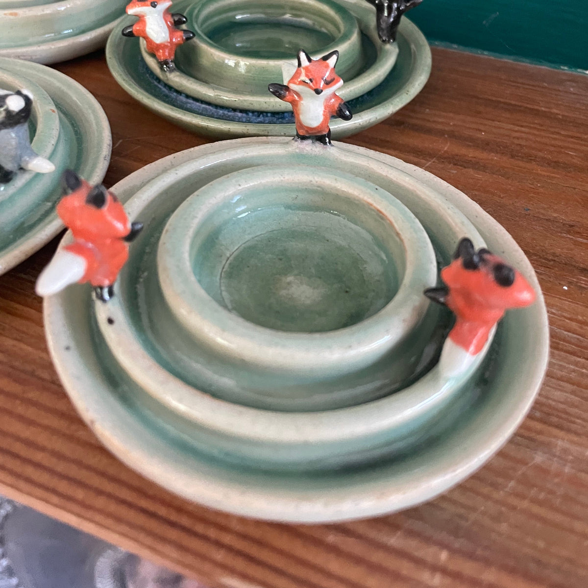 Dancing foxes candle holder