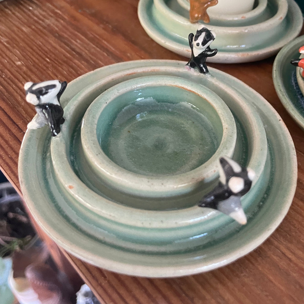 Dancing badger candle holder (light green)