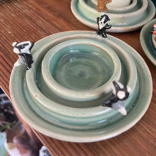 Dancing badger candle holder (light green)