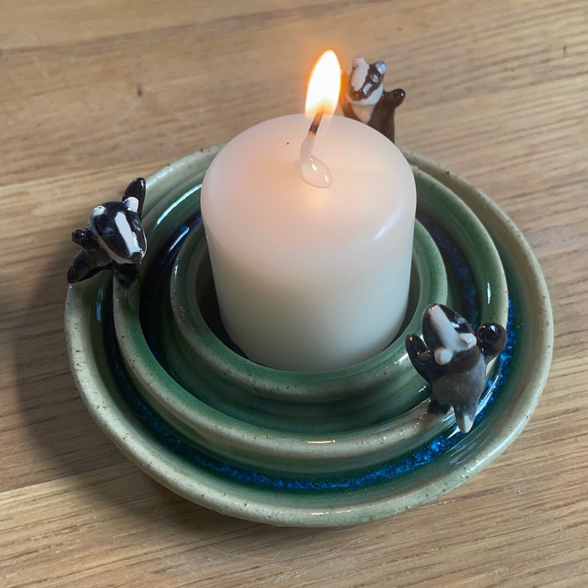 Dancing badger candler holder